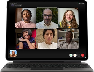 iPad Air, attached to Magic Keyboard, Black color, Group FaceTime call on screen
