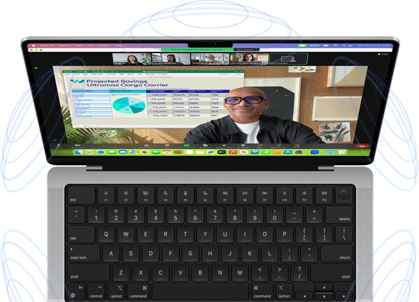 MacBook Pro surrounded by illustrations of blue circles to suggest the 3D feeling of Spatial Audio — onscreen, a person uses the Presenter Overlay feature in a Zoom video meeting to appear in front of the content they are presenting
