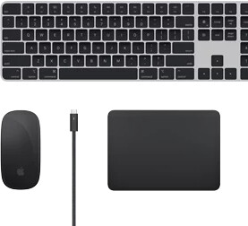 Top view of Mac accessories: Magic Keyboard, Magic Mouse, Magic Trackpad, and Thunderbolt cable.